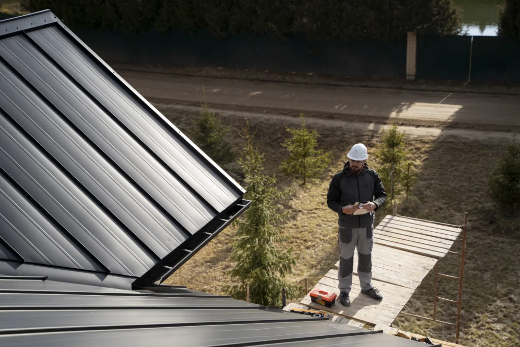 Why roof plumbing is essential for sandringham properties 1 Full shot man wearing protection helmet